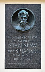 Kamienica Czyncielów w Krakowie. Tablica upamiętniająca powstanie „Wesela”