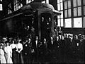 Photo of what appears to be the dedication of the chapel car St. Anthony. It appears to have been taken at the Pullman factory where it was refitted.