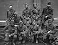 "Iuj koloruloj de la 369-a infanteria regimento de la usona armeo (Harlem Hellfighters), kiuj estis premiitaj per la Milta Kruco 1914-1918 pro braveco en batalo."