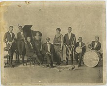 Mary Bradford (fourth from left) and Bennie Moten's Orchestra[1]