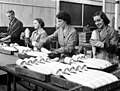 Image 86Workers inspecting practice bombs at a factory in South Australia during 1943 (from Military history of Australia during World War II)