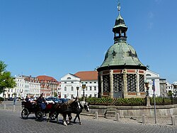 Market Square with the waterworks from 1602 (Wasserkunst), landmark of Wismar