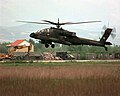 An AH-64A Apache attack helicopter from Task Force Hawk landing at Rinas Airport on 21 April 1999.