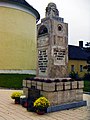 Weichselbaum, Maria Bild, Kriegerdenkmal vor der Nordost-Apsis der Wallfahrtskirche Mariae Heimsuchung