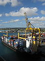 Image 3A container ship docked in the deep water harbour of Bridgetown, Barbados, which opened in 1961. (from History of the Caribbean)