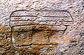 Графіто, що зображує мегалітичний храм з дахом у Мнайдрі