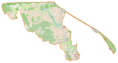 Mapa konturowa powiatu puckiego, blisko górnej krawiędzi nieco na lewo znajduje się punkt z opisem „Karwia”