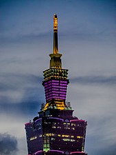 Tip of Taipei 101 illuminated on a Sunday night (purple)