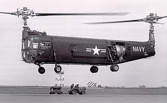Прототип Bell XHSL-1 у польоті. Це був перший гелікоптер USN, оснащений занурювальним гідролокатором (BuNos 129133-129136), що були використані для льотних випробувань.