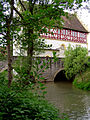 Längsseite des Rathauses mit Breitbachbrücke