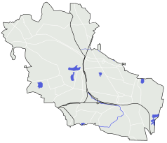 Mapa konturowa Bytomia, blisko centrum na lewo znajduje się punkt z opisem „Pałac Tiele-Winckleróww Miechowicach”