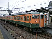 第一話「櫻花抄」裡出現的115系電車，圖為岩舟站小山方向（攝於2007年）