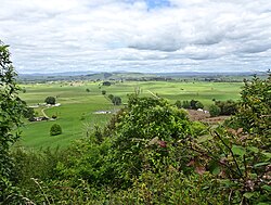 Te Kawa swamp, village and Puketarata hill from Kakepuku