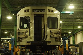 A T-1 in the shops at Greenwood Yard with its rollsign set to Islington