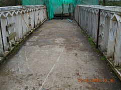 The concrete decking prior to hydrodemolition and the exposure of the cast-iron arches