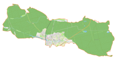 Mapa konturowa gminy Kobiór, blisko centrum na prawo u góry znajduje się ikonka pałacu z opisem „Pałac myśliwski w Promnicach”