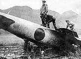 The Akutan Zero is inspected by US military personnel on Akutan Island on July 11, 1942.