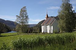 View of Tovdal Church and the river Tovdalselva