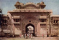 THE GATE OF JAIPUR, INDIA Built of pink stucco and surrounded by a great wall with many towers, this city is the chief financial center of the state of Raj-putana and a commercial emporium of no mean proportions. Paved streets, some a hundred feet wide, divide the city into six equal sections. Founded in 1728 by the great Maharajah Jai Singh II, it was named for him, and its chief attraction is his magnificent palace in the center of the city. It is the only city in India laid out in rectangular blocks.
