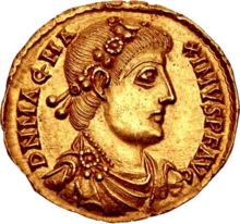 Golden coin depicting man with diadem facing right