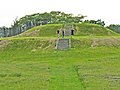 Image 2The largest platform mound at Aztalan, with modern reconstructions of steps and stockade (from History of Wisconsin)