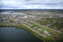 A bird's-eye view on a small town near a lake