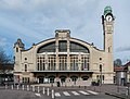 La Gare de Rouen-Rive-Droite, ouverte sous le nom de Gare de la Rue Verte en 1847 et reconstruite de 1912 à 1924 par Adolphe Dervaux, constitue aujourd'hui la gare centrale de Rouen