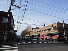 Photograph of buildings at the intersection of two streets