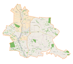 Mapa konturowa gminy Miechów, blisko centrum na lewo znajduje się punkt z opisem „Miechów”