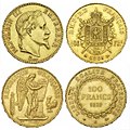 Moedas de ouro de 100 francos de Napoleón III (1869] e da República (1879).