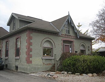 Ontario Cottage: a one- or one-and-a-half-story house with a symmetrical rectangular floor plan and a gable centred over the door, popular in small-town Ontario during the 19th century