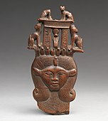 Head of Hathor from a clapper; 1295–664 BC; possibly boxwood; 12 × 6.2 cm; Metropolitan Museum of Art