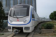 采用初期涂装的PM119型首组列车于北京环行铁道试验