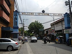 A welcome arch of Veterans Village