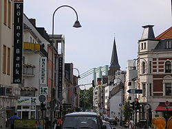 Hauptstraße with Cologne Rodenkirchen Bridge in the background