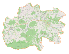 Mapa konturowa powiatu limanowskiego, na dole po prawej znajduje się punkt z opisem „Kościół św. Andrzeja Apostoła”