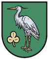 Di verde, all'airone d'argento, imbeccato d'oro (vecchio stemma di Kührstedt, Germania)[3]
