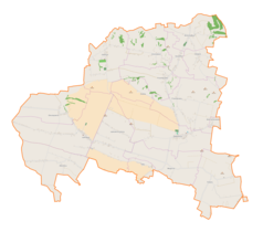 Mapa konturowa gminy Radziemice, blisko centrum na prawo znajduje się punkt z opisem „Radziemice”