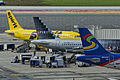 The three different Spirit Airlines liveries. On the top is the 2014 "Taxi" livery, middle is the 2002 "Grayscale" livery, and bottom is the 2007 "Blue" livery.