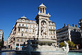 La fontaine des Jacobins, pièce centrale de la place.