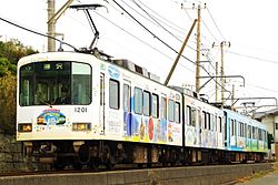 「台湾友好記念電車」ラッピングの1201編成、パンタグラフのシングルアーム化後、2014年