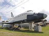 Full-scale replica of a Space Shuttle orbiter which once stood adjacent to the United States Astronaut Hall of Fame