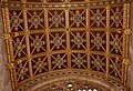 The carved, painted and gilded barrel-vaulted ceiling