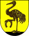 Gru tenente nella zampa un ferro di cavallo (Neugersdorf, Germania, stemma in uso fino al 2011[2])