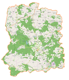 Mapa konturowa powiatu wołowskiego, na dole po prawej znajduje się punkt z opisem „Brzeg Dolny”