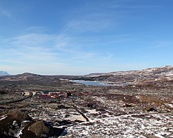 Bifröst village and university, seen from the rim of the crater Stóra Grábrók. Route 1 passes to the east (left), while the lake Hreðavatn is southwest of the village.