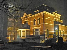 Office building illuminated by high-pressure sodium lamps