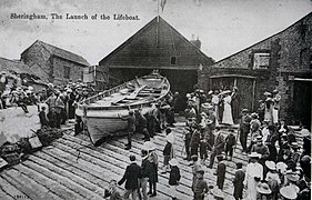 Postacard of the Henry Ramey Upcher outside the first boathouse circa 1904