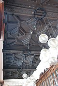 Library ceiling executed in Neo-Renaissance style.