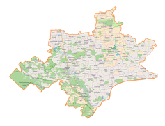 Mapa konturowa powiatu tomaszowskiego, w centrum znajduje się punkt z opisem „Wieprzów Tarnawacki”